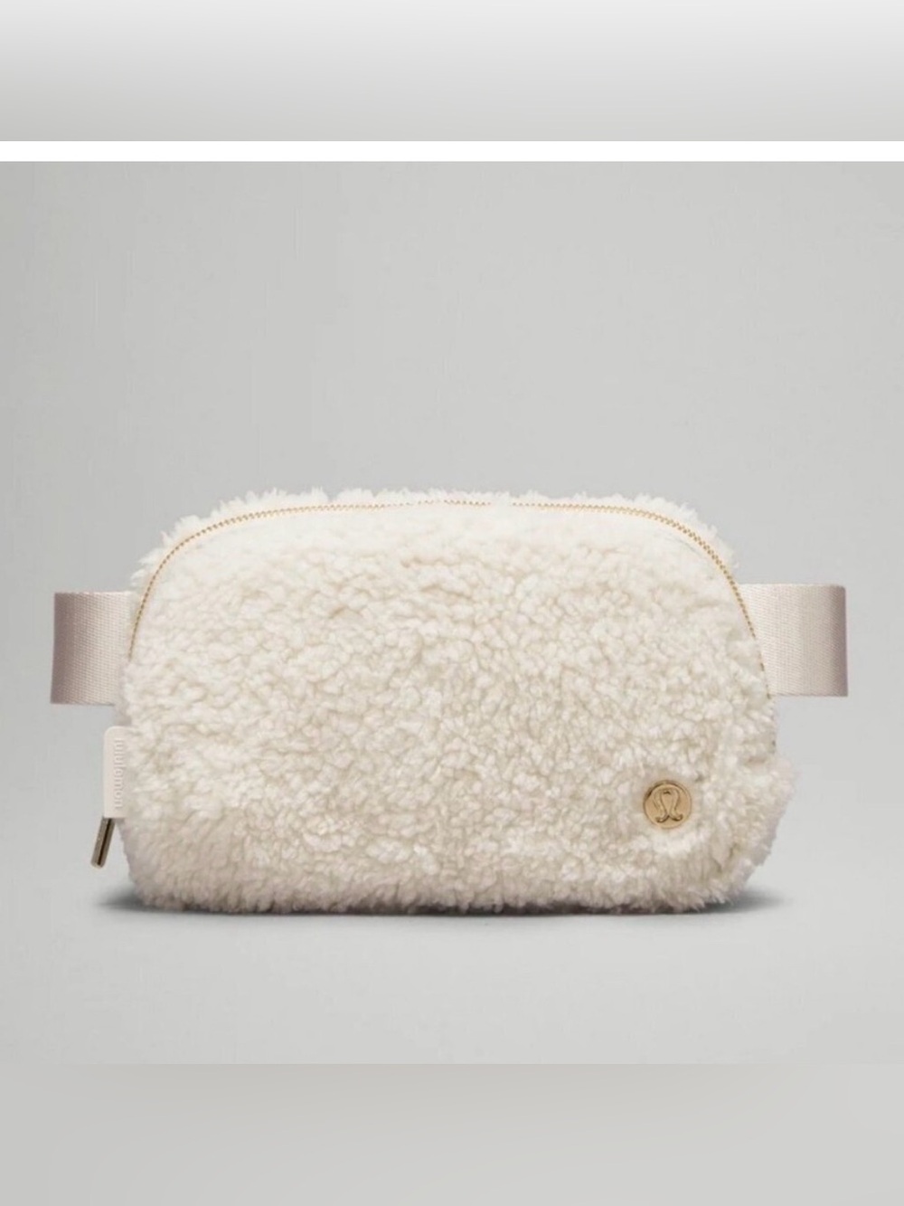 lululemon Fleece Everywhere Belt Bag in white opal/Gold Logo